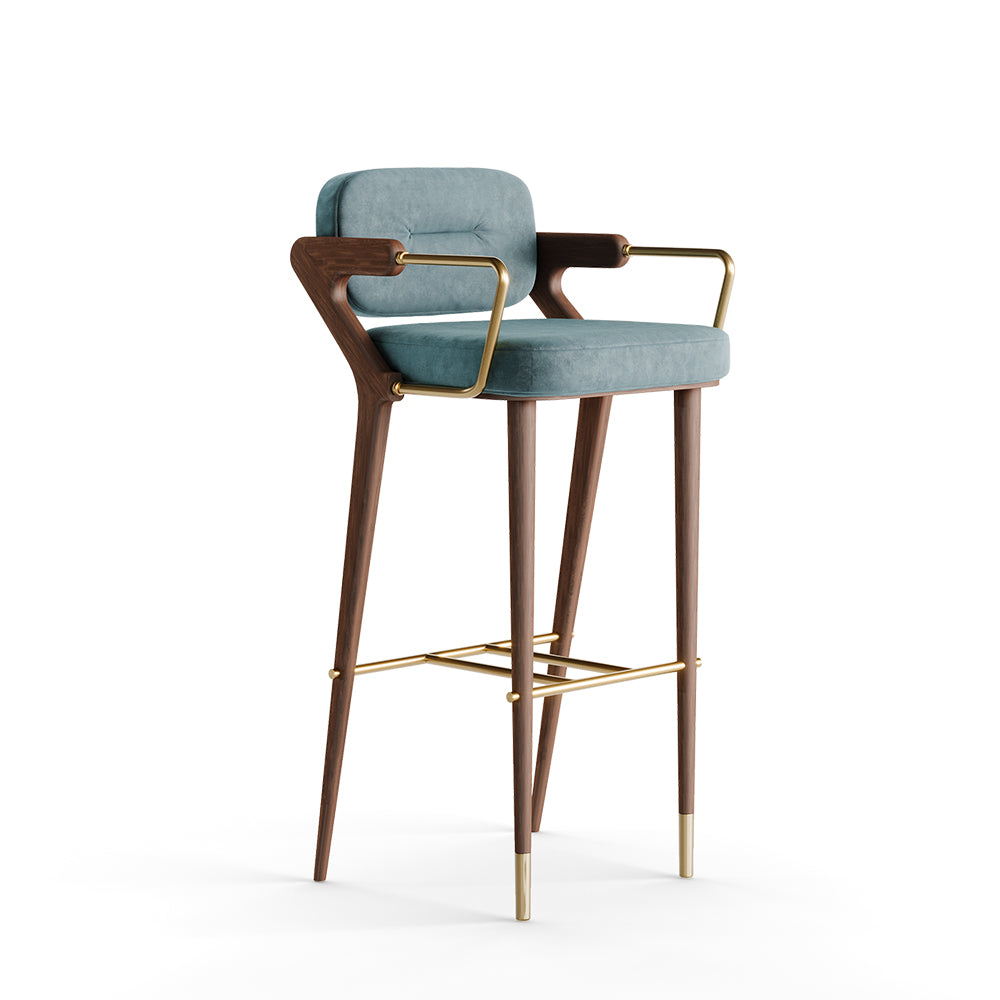 Zimbo açık mavi süet kumaşlı dikiş detaylı ahşap ayaklı ceviz rengi cilalı pirinç detaylı bar sandalyesi